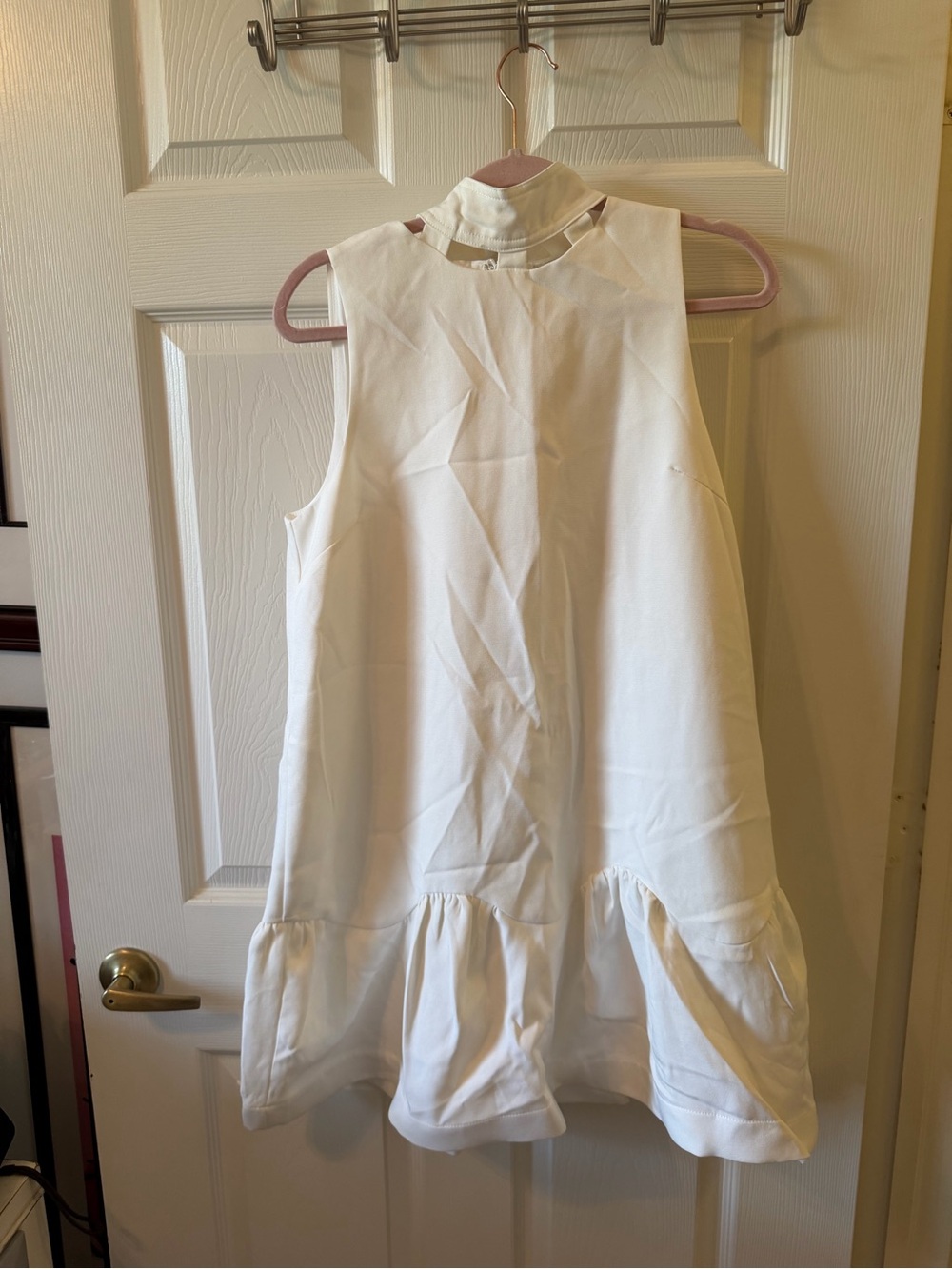 Aura Cream Sleeveless Ruffle-Hem Mini Dress